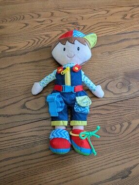 June Garden .learn to dress Boy Doll . Zipper,  snaps, belt, laces . 15 inches.